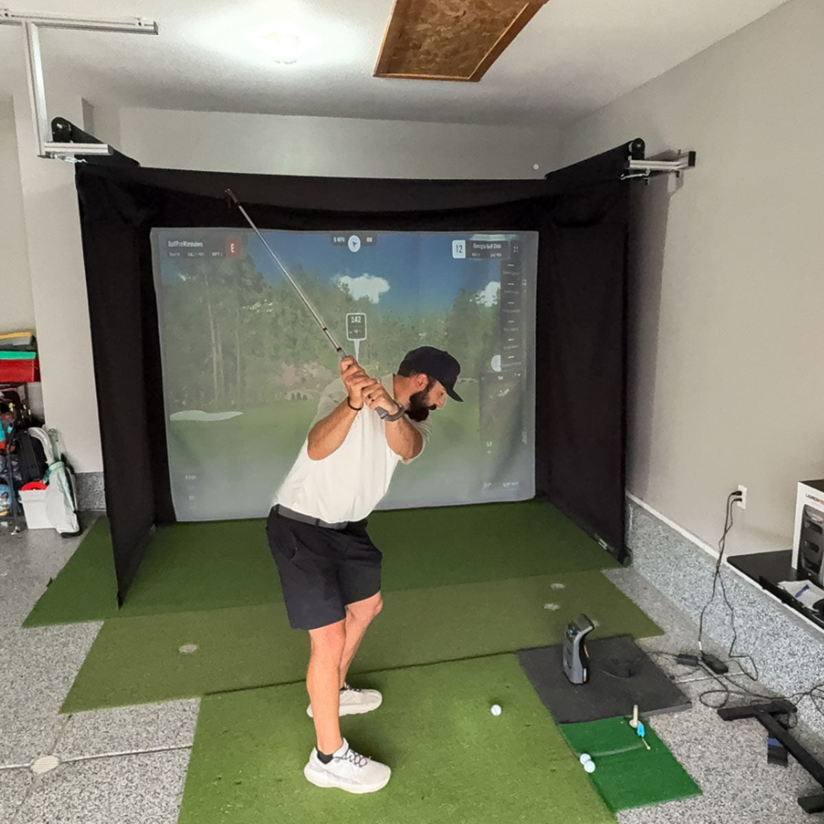 Blue Tees Golf Rainmaker SportScreen Vanish Retractable Golf Studio Complete Package | Home Golf Simulator Studio with Impact Screen, Enclosure, Hitting Mat, Putting Turf & Projector